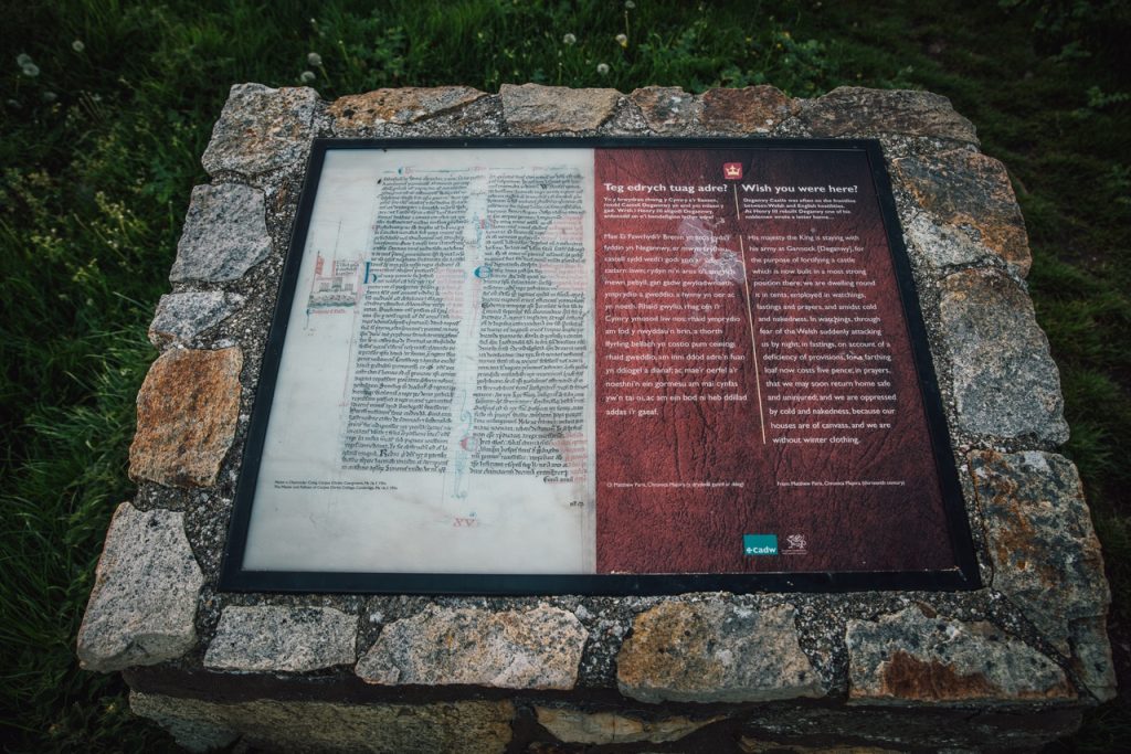 An information plaque mounted on a stone base, located outdoors. The plaque contains text, which is not legible in this image.